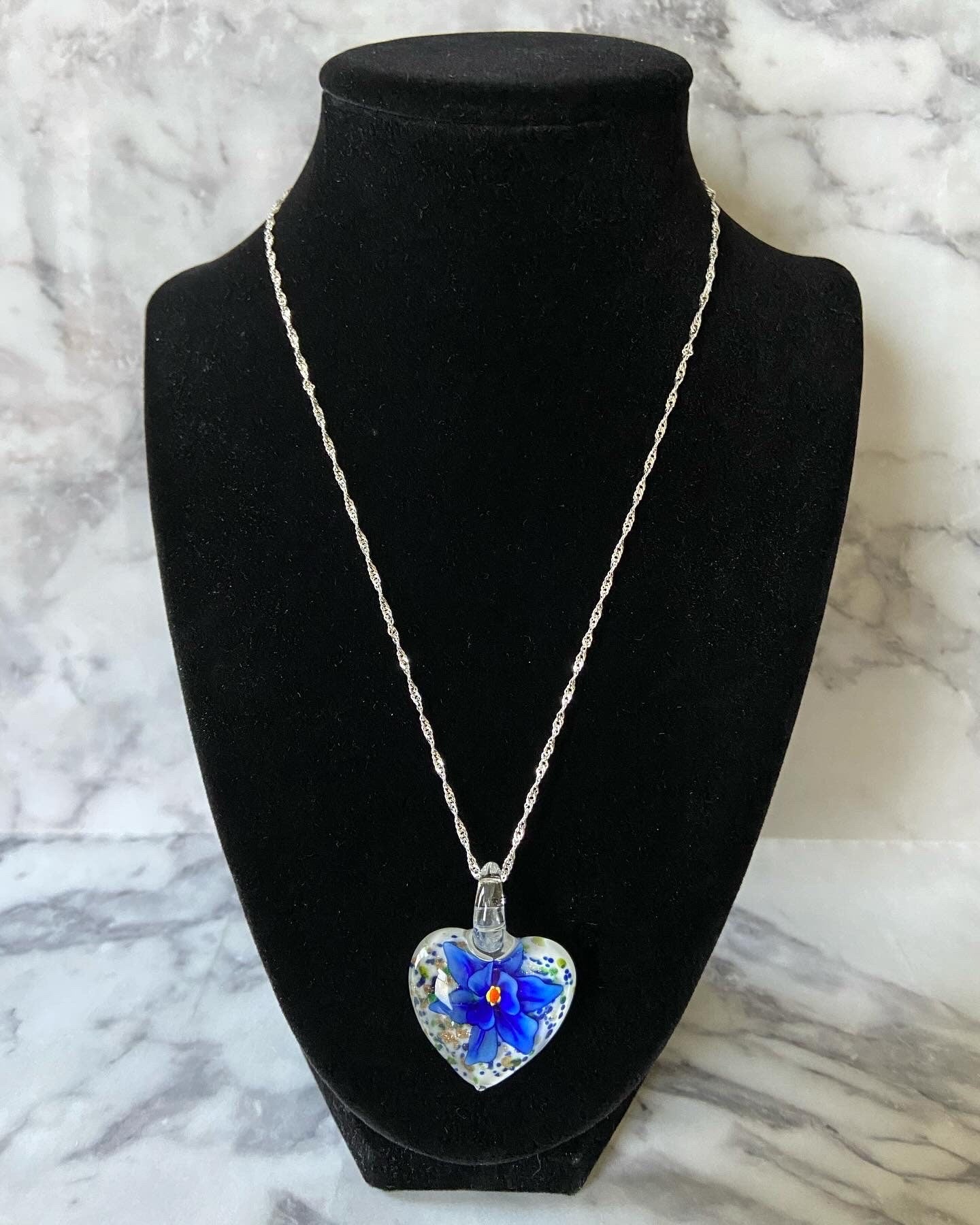 Large cobalt blue floral with gold glitter on white Murano style heart glass necklace