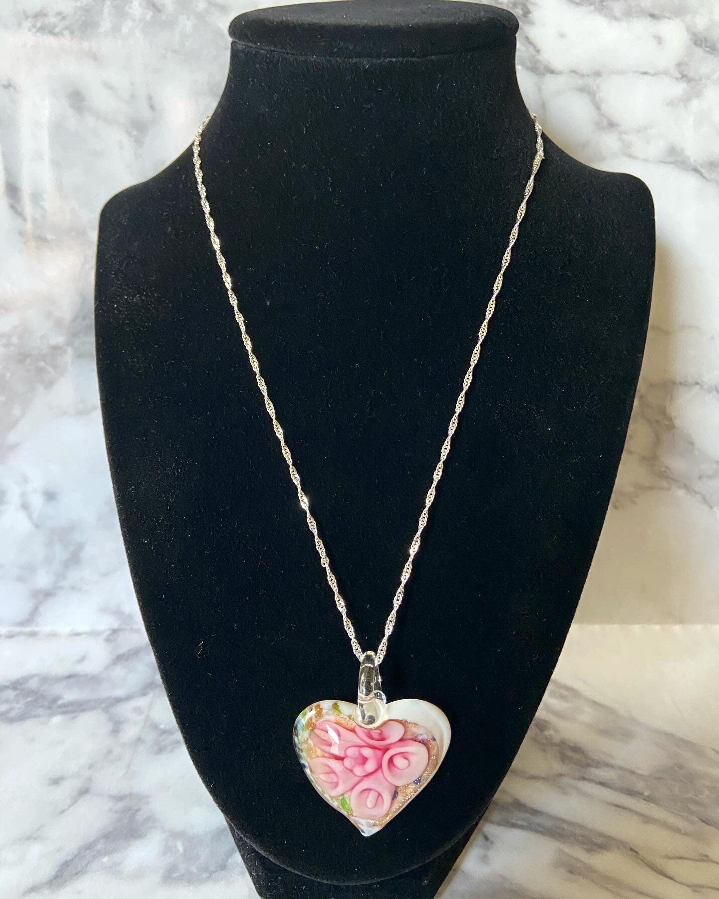 Large light pink calla lily floral with gold glitter on white Murano style heart glass necklace