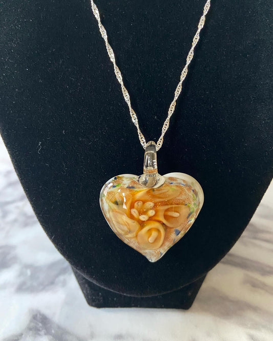 Large cream yellow calla lily floral with gold glitter on white Murano style heart glass necklace