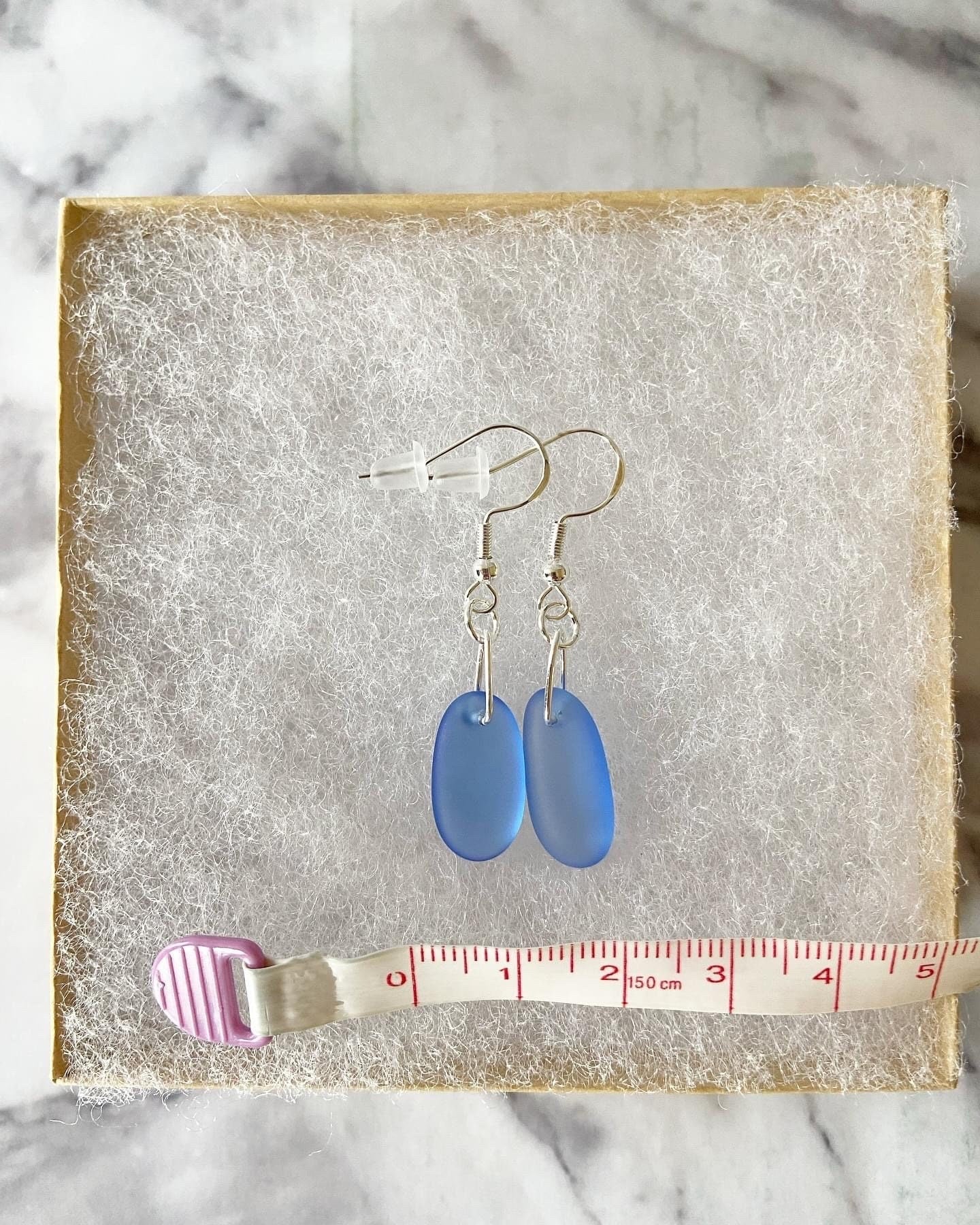 Blue recycled sea glass drop earrings with traditional hooks