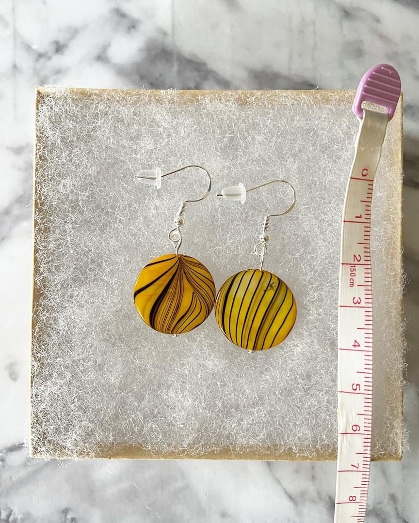 Yellow black zebra striped shell earrings