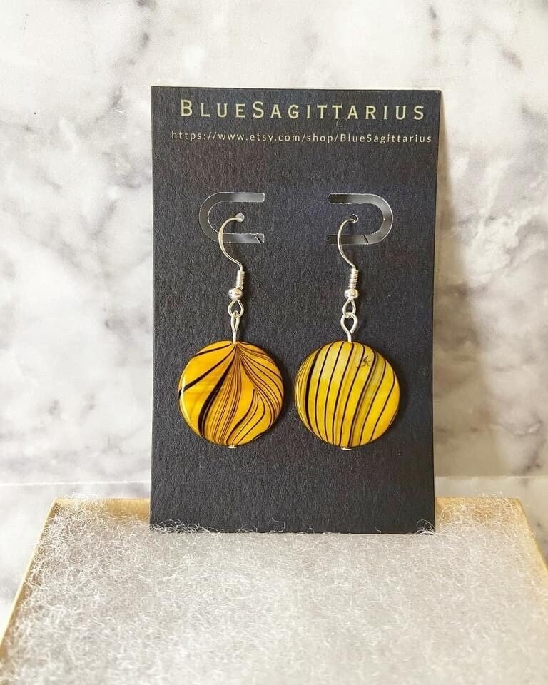 Yellow black zebra striped shell earrings