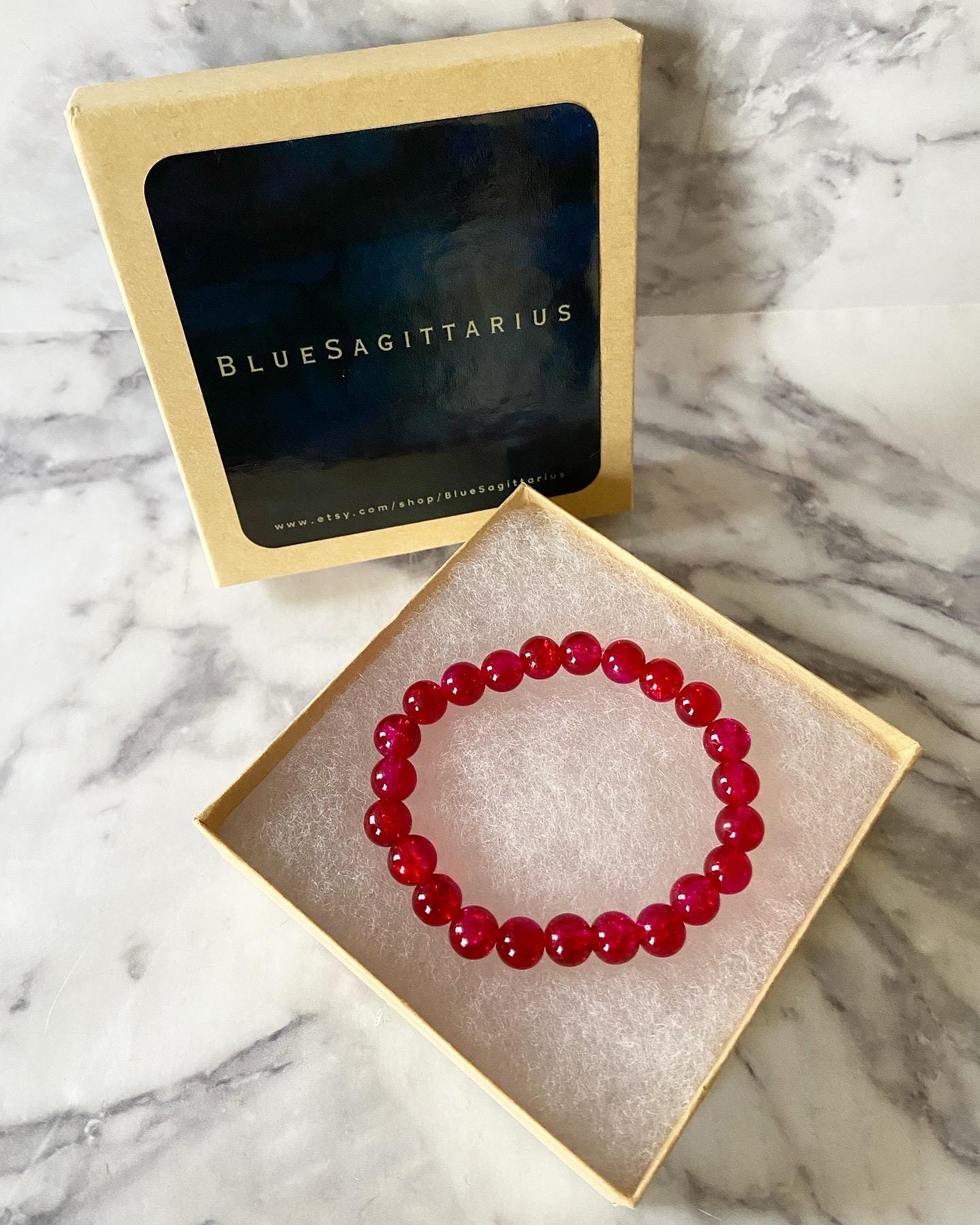 Two-tone red and pink crackle glass stretch bracelet with 8mm round beads