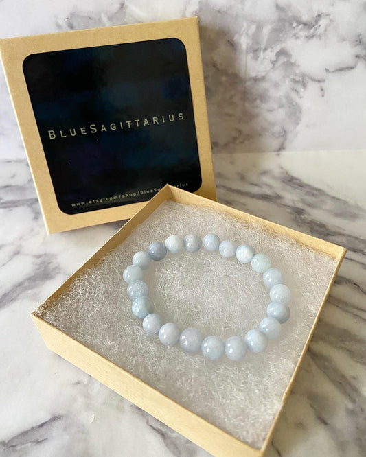 Light blue aquamarine quartz stretch bracelet with 8mm round quartz beads