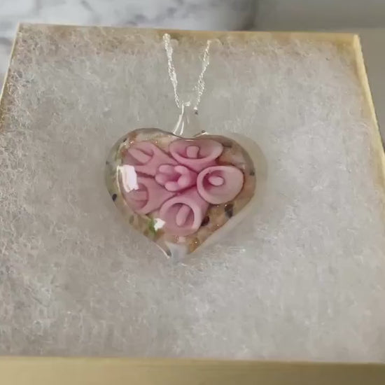 Large light pink calla lily floral with gold glitter on white Murano style heart glass necklace